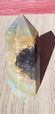 Natural polished Caribbean Blue Calcite point