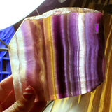 Natural polished Rainbow Fluorite with raw edge