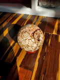 Natural polished Amber Calcite sphere with druzy