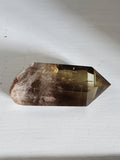 Natural polished Smokey Citrine point with raw base