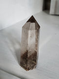 Natural polished Garden Quartz point with rutiles