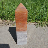 Natural polished Fire Quartz point