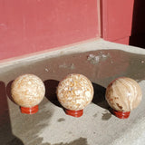 Natural polished Amber Calcite sphere