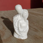 Natural polished carved Howlite couple