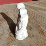 Natural polished carved Howlite couple
