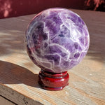 Natural polished Chevron Amethyst sphere