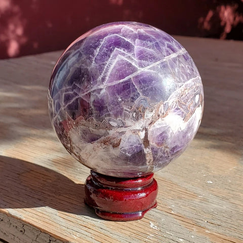 Natural polished Chevron Amethyst sphere