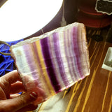 Natural polished Rainbow Fluorite with raw edge