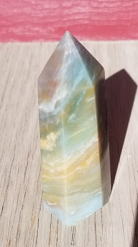 Natural polished Caribbean Blue Calcite point