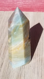 Natural polished Caribbean Blue Calcite point