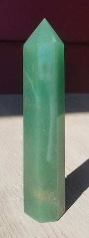 Natural polished Green Aventurine point