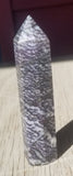 Natural polished Zebra Jasper point