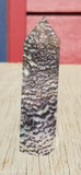 Natural polished Zebra Jasper point