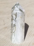 Natural polished Green Moss Agate point with druse