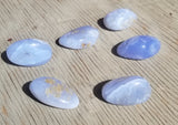 Natural polished Blue Lace Agate tumbled palm stones with druse