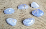 Natural polished Blue Lace Agate tumbled palm stones with druse