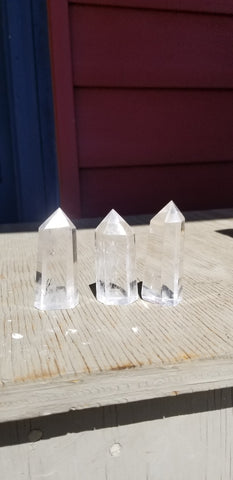 Natural polished Clear Quartz Crystal point with rainbow