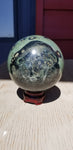Natural polished Kambaba sphere with stand
