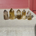 Natural polished Citrine point