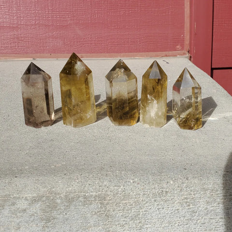 Natural polished Citrine point