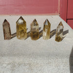 Natural polished Citrine point