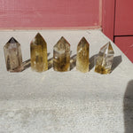 Natural polished Citrine point
