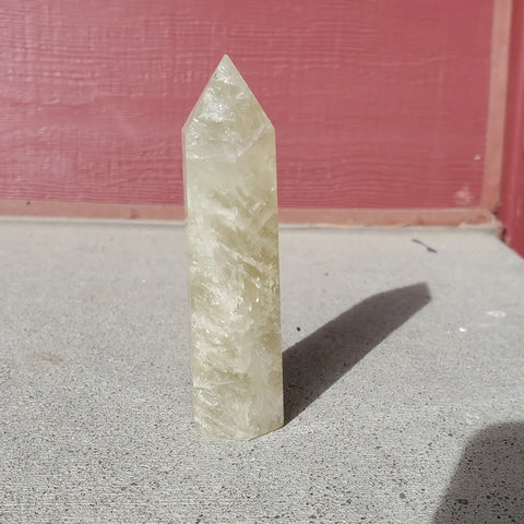 Natural polished Citrine point