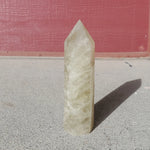 Natural polished Citrine point