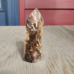 Natural polished Black Opal point