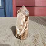 Natural polished Black Opal point