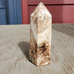 Natural polished Black Opal point