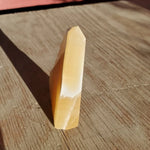 Natural polished and raw Orange Calcite slab point